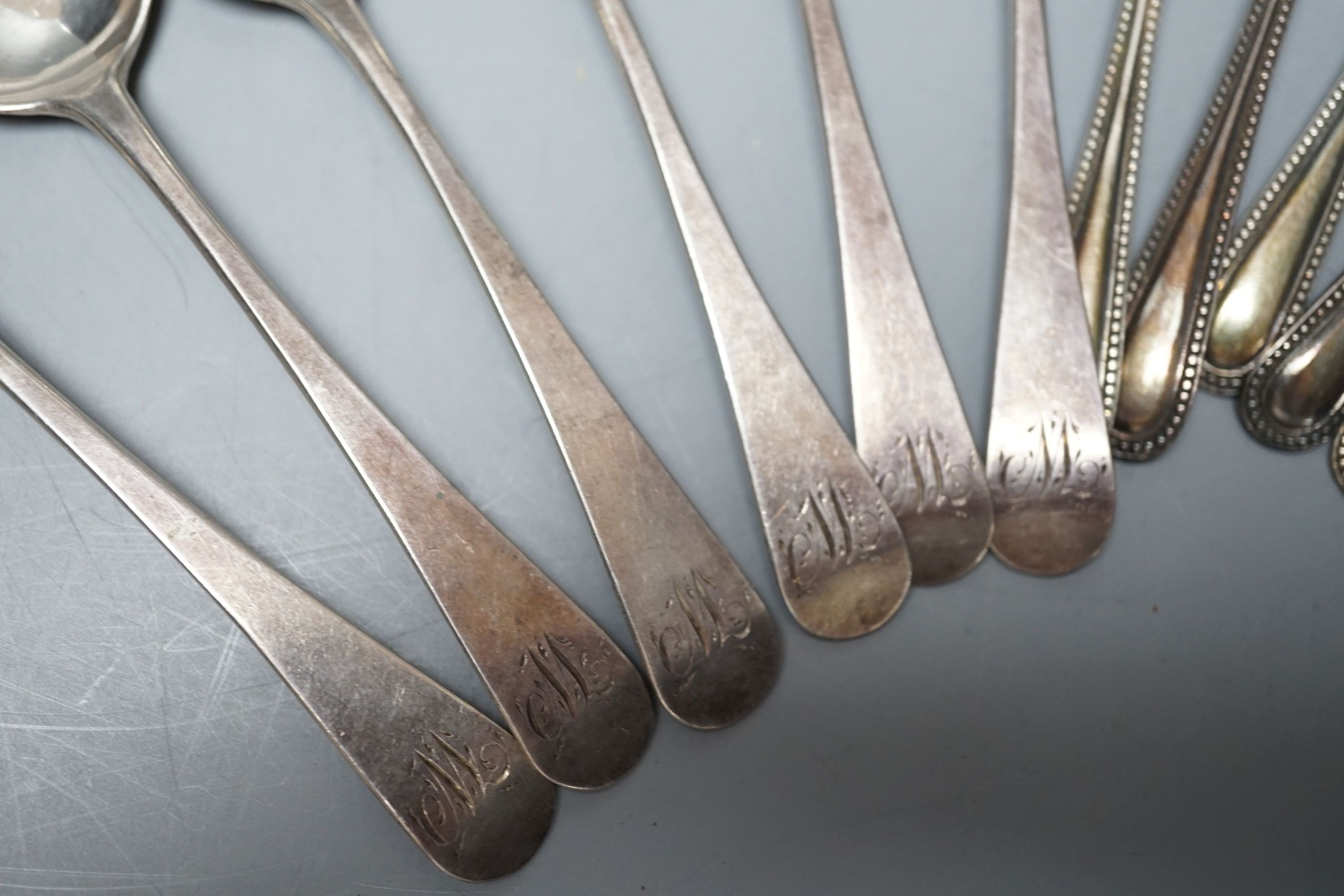 Two silver cigarette cases, a Georgian silver wine label and two sets of six silver teaspoons including London, 1801, 12.5oz.